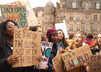 Kids protesting in United Kingdom about Climate Change Awareness