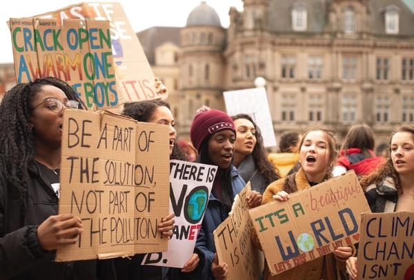 Kids protesting in United Kingdom about Climate Change Awareness